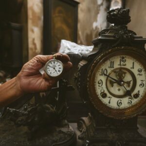 Explore the charm of antique clocks with intricate designs in a Kolkata workshop setting.
