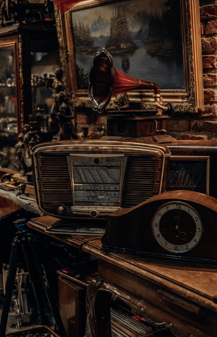 gallery-4 A rustic still life featuring vintage radio, clock, and gramophone.
