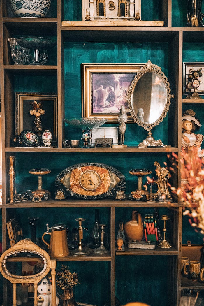 services-02 A vintage shelf filled with diverse antiques and memorabilia. Perfect for retro decor inspiration.